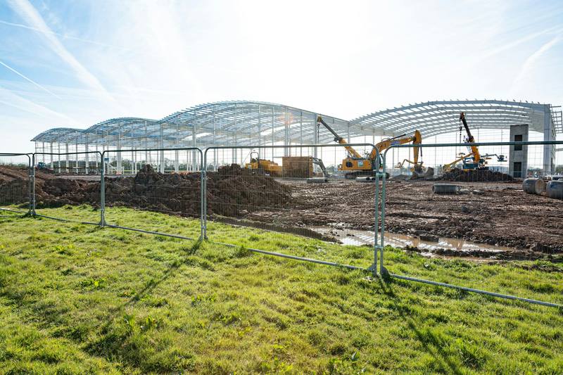Steel portal frames going up on a commercial building site